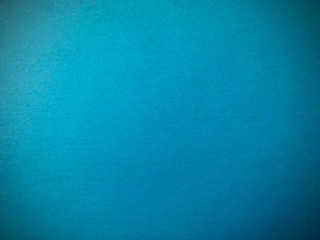 Fototapeta na wymiar Blue paper texture. Beautiful blue background with darkened edges