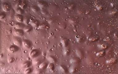 Сhocolate bar with nuts background texture