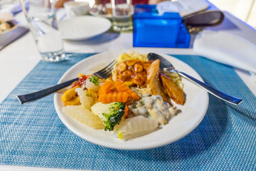 Vegetables, fruits and sushi on the table