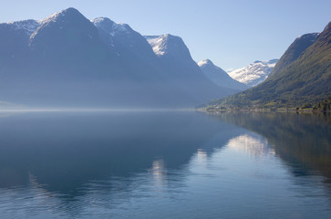 Fototapeta na wymiar Traveling Norway along the fjords with beautiful reflections