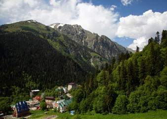 Fototapeta na wymiar Village Dombay among the Caucasus mountains in summer