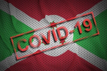 Burundi flag and red Covid-19 stamp. Coronavirus 2019-nCov outbreak