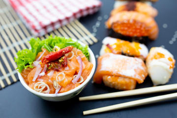 Sushi, Sashimi with chopsticks, Japanese sushi with soy sauce and wasabi.