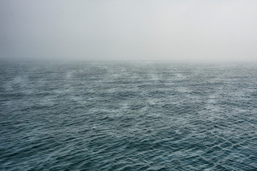 Naklejka na ściany i meble The deep sea is shrouded in dense and dense fog