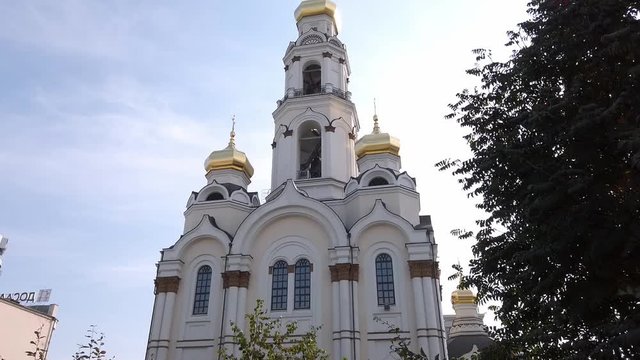 Beautiful Russian church and park at sunset, Grand Zlatoust Church (Bolshoi Zlatoust) in Ekaterinburg, Russia