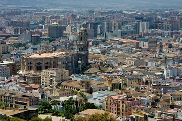 Naklejka premium The cathedral rises above the city houses