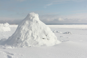 Igloo  standing on a snowy  reservoir in the winter, Novosibirsk, Russia