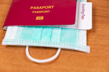 Coronavirus and travel concept. The concept of restrictions for tourism. Passport and protective medical masks. Covid19 Corona virus disease danger pandemic spread worldwide global