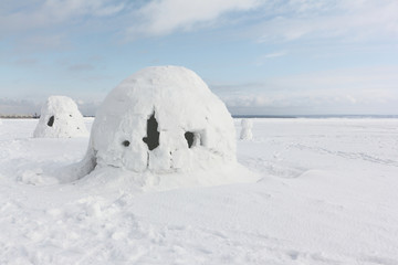 Igloo  standing on a snowy  reservoir in the winter, Novosibirsk, Russia