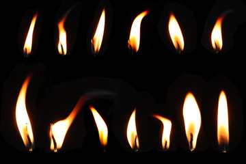  Set of fire flame. Realistic candle flame isolated on black background. - Powered by Adobe