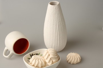 Still life of white objects and cups