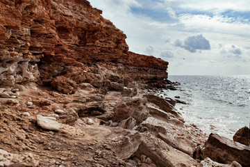 Seascape, sea and rocks on a sunny day