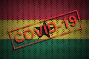 Ghana flag and red Covid-19 stamp. Coronavirus 2019-nCov outbreak