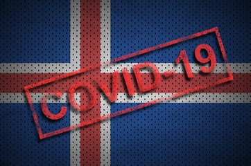 Iceland flag and red Covid-19 stamp. Coronavirus 2019-nCov outbreak