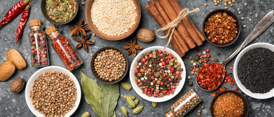 Different spices, kitchen herbs and seeds for tasty meals