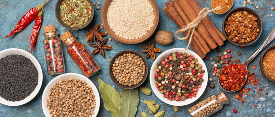 Different spices, kitchen herbs and seeds for tasty meals