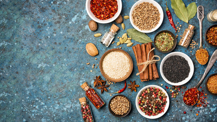 Different spices, kitchen herbs and seeds for tasty meals