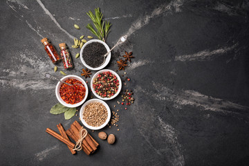 Different spices, kitchen herbs and seeds for tasty meals