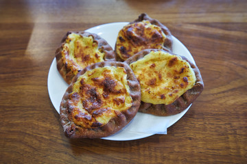 Karelian traditional pies on a plate known as Kalitki