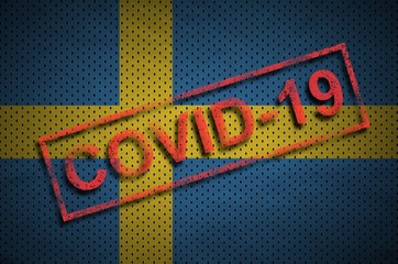 Sweden flag and red Covid-19 stamp. Coronavirus 2019-nCov outbreak