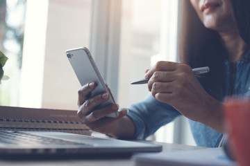 Businesswoman using smartphone