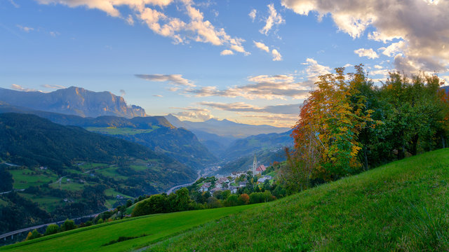 View from the Villanders village south overlooking the valley and village to the Eisacktal valley and themountain sciliar on a bright autumn day.