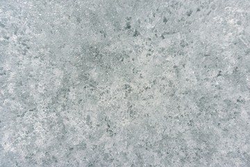 Colorful ice. Abstract ice texture. Nature background frozen river, lake, winter