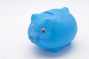 Blue piggy bank or money box isolated on a white background