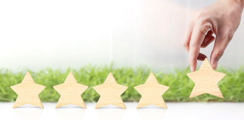  Wooden five star in hand shape. The best excellent business services