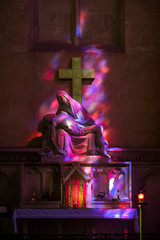 Pieta in Hues of Purple and red - symbolic reference to the color of the wine in the Collegiale...