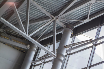 close-up view of the connection of metal beams. strong iron construction made of channels that holds the roof