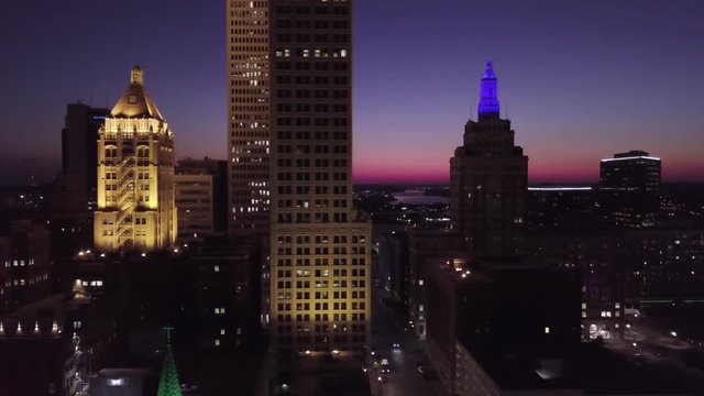 Tulsa skyline and Arkansas River at sunset flyby drone.