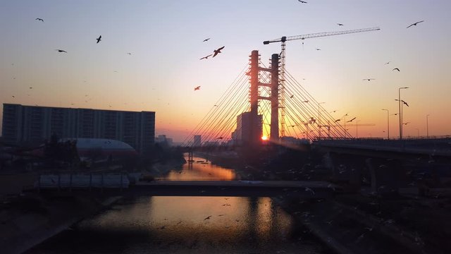 Bridge construction site at sunrise cityscape, Ciurel junction, Bucharest, Romania