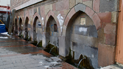 ERZURUM, TURKEY - MARCH 02, 2020 : Historical old Erzurum mosques. Stone carvings. (Sabakhane) fountains.