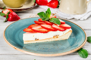 Slice of strawberry pie on a beautiful plate
