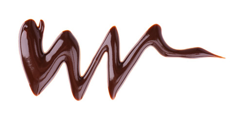 Chocolate syrup drizzle isolated on white background. Splashes of sweet chocolate sauce. Top view.