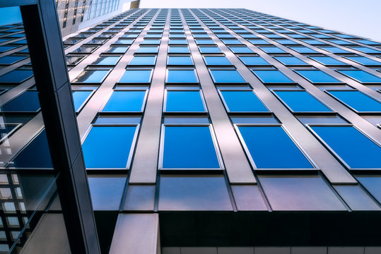 Glazing panel patterns and textures at a high rise office building curtain wall in Sydney CBD, Australia.