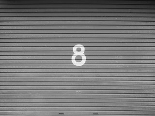 number 8 on material door.steel or aluminium door.sign number.