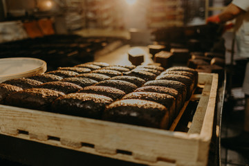 Freshly baked traditional bread on wooden table