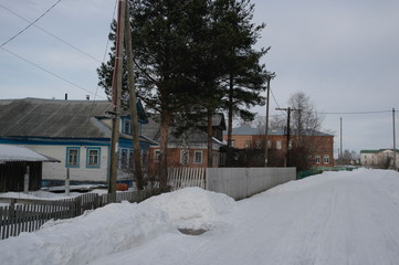 village street in winter in the North