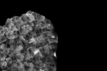 Large piece of living raw amethyst with iridescent faces, monochrome minimalist style