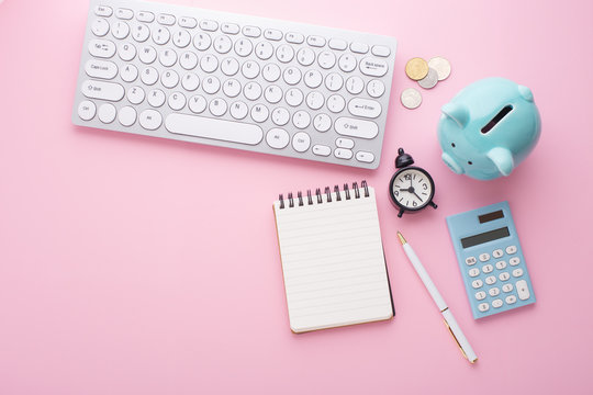 Saving Money Planning On Pink Desk