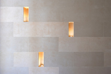Modern wall lamp light in sand stone wall gap interior building decoration, concept home and living