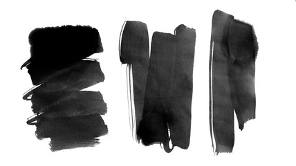 Set of black ink brush stokes isolated on white background