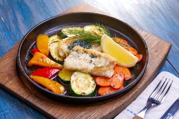 fish with vegetables and lemon