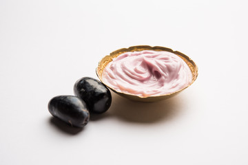Black grapes, yogurt and honey mix face mask or cream forskin dark spot removal treatment, created using Angoor extract, curd and honey. selective focus