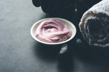 Black grapes, yogurt and honey mix face mask or cream forskin dark spot removal treatment, created using Angoor extract, curd and honey. selective focus