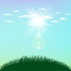 Fototapeta na wymiar sunny sky sunlight and grass hill