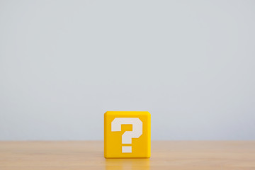 Question mark cube on the table