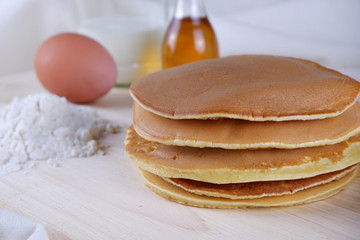Hot pancake with sugar and honey toppings